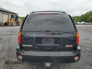2004 GMC Envoy SLT with VIN 1GKDT13S842210243, listed as a Copart auction lot 55672595 with 148,232 mi miles and Clean Title. Bid and sale history available at DreamBid. Image 6.