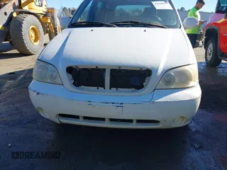 2005 Kia Sedona LX with VIN KNDUP132956703200, listed as a IAAI auction lot 41700159 with 125,578 mi miles. Bid and sale history available at carsss.com. Image 6.
