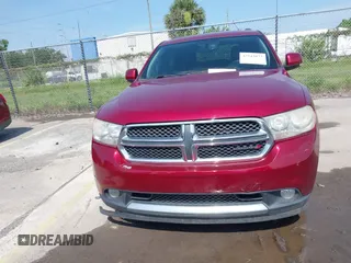 2013 Dodge Durango Crew z VIN 1C4RDJDG6DC672934, wystawiony jako IAAI lot #42542073 z przebiegiem 181 812 mil mil oraz . Historia ofert i sprzedaży dostępna na DreamBid. Obrazek 12.