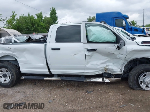 2024 Ram 2500 Tradesman with VIN 3C6UR5HJ4RG125908, listed as a IAAI auction lot 42198984 with 21,280 mi miles and . Bid and sale history available at DreamBid. Image 14.