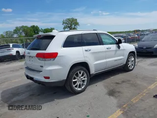 2014 Jeep Grand Cherokee Summit with VIN 1C4RJFJG0EC174871, listed as a IAAI auction lot 42341312 with 170,743 mi miles and . Bid and sale history available at DreamBid. Image 4.