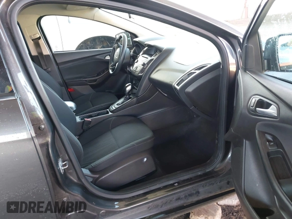 2016 Ford Focus SE with VIN 1FADP3F28GL330815, listed as a IAAI auction lot 41696821 with 125,247 mi miles. Bid and sale history available at carsss.com. Image 5.