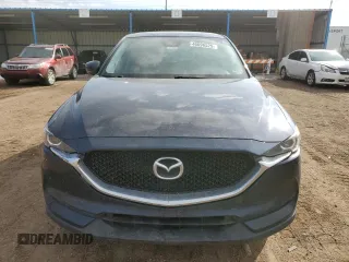 2017 Mazda CX-5 Touring z VIN JM3KFBCL7H0212955, wystawiony jako Copart lot #46096525 z przebiegiem 94 606 mil mil oraz Szkody całkowita. Historia ofert i sprzedaży dostępna na DreamBid. Obrazek 5.