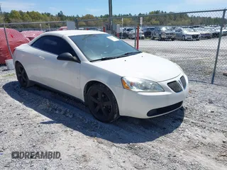 2007 Pontiac G6 GT with VIN 1G2ZH35N774129253, listed as a IAAI auction lot 41908872 with 128,334 mi miles. Bid and sale history available at carsss.com. Image 1.