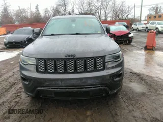 2020 Jeep Grand Cherokee Altitude with VIN 1C4RJFAGXLC211518, listed as a IAAI auction lot 41668994 with 130,371 mi miles. Bid and sale history available at carsss.com. Image 12.