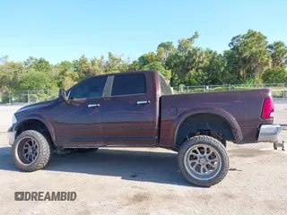 2015 Ram 1500 Big Horn with VIN 3C6RR7LT5FG597847, listed as a IAAI auction lot 42042971 with 212,541 mi miles and . Bid and sale history available at DreamBid. Image 14.