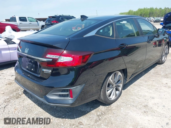 2018 Honda Clarity Plug-In Hybrid Touring with VIN JHMZC5F33JC011358, listed as a IAAI auction lot 42010720 with 61,366 mi miles. Bid and sale history available at carsss.com. Image 4.