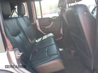 2015 Jeep Wrangler Unlimited Sport z VIN 1C4BJWDG6FL768265, wystawiony jako IAAI lot #42150124 z przebiegiem 85 108 mil mil oraz . Historia ofert i sprzedaży dostępna na DreamBid. Obrazek 8.