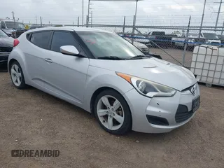 2014 Hyundai Veloster with VIN KMHTC6AD6EU205052, listed as a IAAI auction lot 41957482 with Not provided miles and . Bid and sale history available at DreamBid. Image 1.