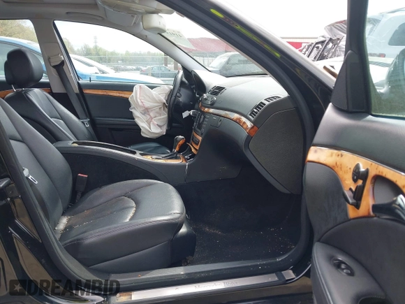2007 Mercedes-Benz E-Class 3.5L with VIN WDBUF87X47B170652, listed as a IAAI auction lot 41919983 with 149,245 mi miles. Bid and sale history available at carsss.com. Image 5.