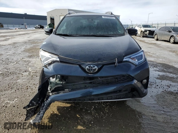 2018 Toyota RAV4 SE with VIN 2T3JFREV3JW806407, listed as a Copart auction lot 48980005 with 70,165 mi miles and Salvage title. Bid and sale history available at DreamBid. Image 5.