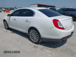 2013 Lincoln MKS with VIN 1LNHL9DK2DG606838, listed as a IAAI auction lot 42454441 with 163,475 mi miles and . Bid and sale history available at DreamBid. Image 3.