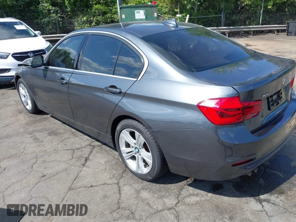 2018 BMW 3 Series 330i xDrive with VIN WBA8D9G54JNU70241, listed as a IAAI auction lot 42226428 with Not provided miles and . Bid and sale history available at DreamBid. Image 3.