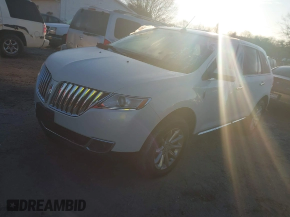2012 Lincoln MKX with VIN 2LMDJ6JK7CBL11512, listed as a IAAI auction lot 41832419 with 127,485 mi miles. Bid and sale history available at carsss.com. Image 18.