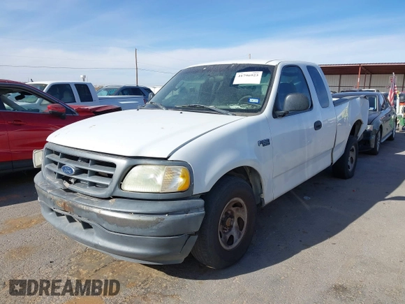 2003 Ford F-150 XL with VIN 1FTRX17213NA81064, listed as a IAAI auction lot 41796923 with 339,333 mi miles. Bid and sale history available at carsss.com. Image 2.