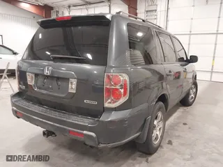 2006 Honda Pilot EX with VIN 2HKYF18466H504644, listed as a IAAI auction lot 41949350 with 256,464 mi miles. Bid and sale history available at carsss.com. Image 4.