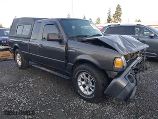 2011 Ford Ranger XLT with VIN 1FTLR4FE6BPA39117, listed as a IAAI auction lot 41388849 with 215,294 mi miles. Bid and sale history available at carsss.com. Image 1.