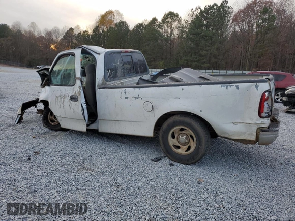 2000 Ford F-150 XL with VIN 2FTRF17L6YCA50613, listed as a Copart auction lot 83528344 with Not provided miles and Salvage title. Bid and sale history available at DreamBid. Image 2.