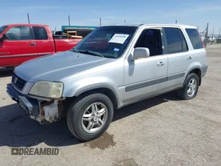 1999 Honda CR-V EX with VIN JHLRD1861XC025446, listed as a IAAI auction lot 41852155 with 201,598 mi miles. Bid and sale history available at carsss.com. Image 2.