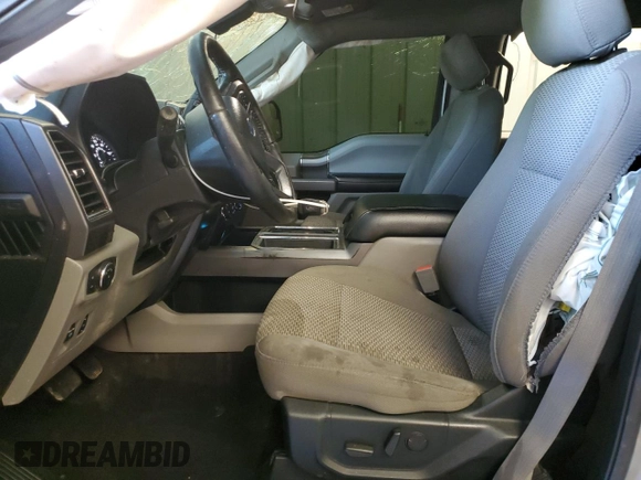 2020 Ford F-150 XL with VIN 1FTEW1E57LKF44499, listed as a Copart auction lot 60336735 with 156,745 mi miles and Salvage title. Bid and sale history available at DreamBid. Image 7.