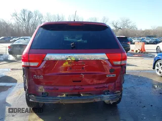 2012 Jeep Grand Cherokee Laredo with VIN 1C4RJFAG3CC163764, listed as a IAAI auction lot 41719137 with 198,827 mi miles. Bid and sale history available at carsss.com. Image 17.