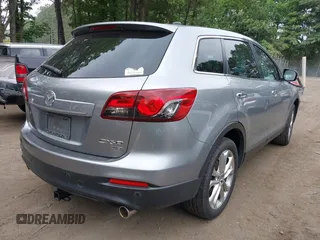 2013 Mazda CX-9 Grand Touring with VIN JM3TB3DV1D0409510, listed as a IAAI auction lot 42578873 with 154,570 mi miles and . Bid and sale history available at DreamBid. Image 4.