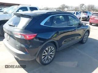 2020 Ford Escape Titanium Hybrid with VIN 1FMCU0DZ9LUC08090, listed as a IAAI auction lot 41674697 with 43,586 mi miles and . Bid and sale history available at DreamBid. Image 4.
