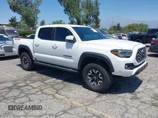 2022 Toyota Tacoma SR with VIN 3TMCZ5ANXNM461172, listed as a IAAI auction lot 42484621 with 58,081 mi miles and . Bid and sale history available at DreamBid. Image 1.