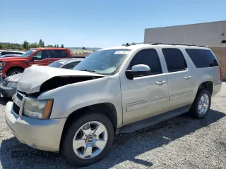 2013 Chevrolet Suburban LT z VIN 1GNSCJE06DR140058, wystawiony jako Copart lot #56317995 z przebiegiem 124 345 mil mil oraz Szkoda całkowita • Salvage title. Historia ofert i sprzedaży dostępna na DreamBid. Obrazek 1.