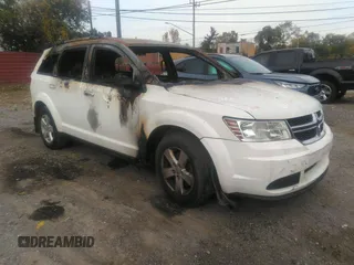 2015 Dodge Journey SE z VIN 3C4PDCAB6FT580077, wystawiony jako IAAI lot #40627471 z przebiegiem Nie podano mil oraz . Historia ofert i sprzedaży dostępna na DreamBid. Obrazek 1.