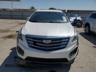 2017 Cadillac XT5 FWD z VIN 1GYKNARS3HZ297366, wystawiony jako Copart lot #53908815 z przebiegiem 95 834 mil mil oraz Szkoda całkowita • Salvage title. Historia ofert i sprzedaży dostępna na DreamBid. Obrazek 5.