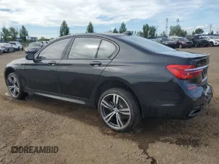 2019 BMW 7 Series 750i xDrive with VIN WBA7B0C53KG527537, listed as a Copart auction lot 64113345 with 36,820 mi miles and Salvage title. Bid and sale history available at DreamBid. Image 2.