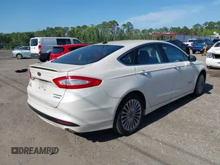 2014 Ford Fusion Titanium Hybrid with VIN 3FA6P0RU3ER279212, listed as a IAAI auction lot 42241465 with 155,841 mi miles and . Bid and sale history available at DreamBid. Image 4.