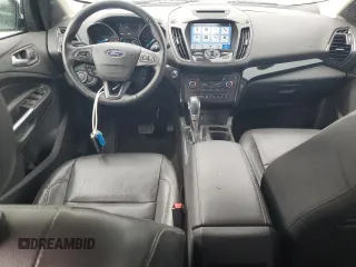 2018 Ford Escape Titanium z VIN 1FMCU9J94JUB49827, wystawiony jako Copart lot #55697385 z przebiegiem 98 682 mil mil oraz Szkoda całkowita • Salvage title. Historia ofert i sprzedaży dostępna na DreamBid. Obrazek 8.