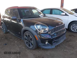 2014 MINI Countryman S z VIN WMWZC5C57EWP39919, wystawiony jako IAAI lot #41613909 z przebiegiem 139 138 mil mil oraz . Historia ofert i sprzedaży dostępna na DreamBid. Obrazek 1.