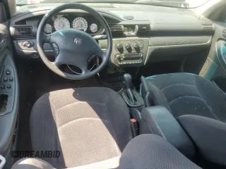 2006 Dodge Stratus SXT z VIN 1B3EL46X46N175664, wystawiony jako Copart lot #65221714 z przebiegiem 130 354 mil mil oraz Tytuł czysty. Historia ofert i sprzedaży dostępna na DreamBid. Obrazek 8.
