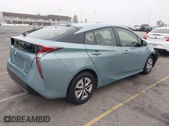 2017 Toyota Prius Two with VIN JTDKARFU7H3052594, listed as a IAAI auction lot 42035969 with 50,789 mi miles and . Bid and sale history available at DreamBid. Image 4.