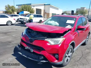 2016 Toyota RAV4 XLE with VIN 2T3WFREV3GW239632, listed as a IAAI auction lot 41860727 with 135,850 mi miles. Bid and sale history available at carsss.com. Image 6.