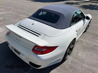 2010 Porsche 911 Turbo with VIN WP0CD2A91AS773141, listed as a Copart auction lot 54437475 with 7,522 mi miles and Salvage Title. Bid and sale history available at carsss.com. Image 4.
