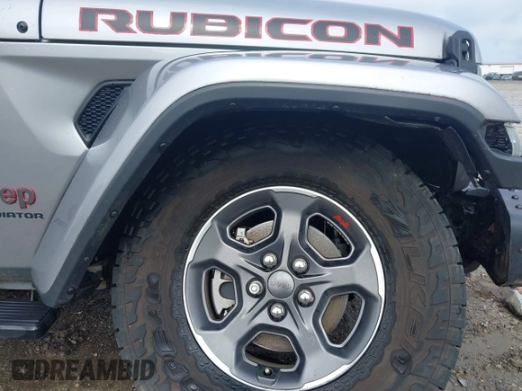 2020 Jeep Gladiator Rubicon z VIN 1C6JJTBG7LL181833, wystawiony jako IAAI lot #42493073 z przebiegiem 13 775 mil mil oraz . Historia ofert i sprzedaży dostępna na DreamBid. Obrazek 17.