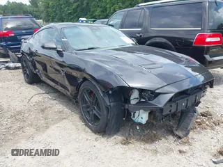 2022 Ford Mustang EcoBoost with VIN 1FA6P8TH9N5141414, listed as a IAAI auction lot 42467049 with 45,744 mi miles and . Bid and sale history available at DreamBid. Image 1.