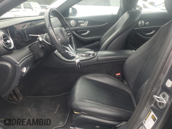 2019 Mercedes-Benz E 300 with VIN WDDZF4KB7KA553856, listed as a Copart auction lot 61025735 with 59,001 mi miles and Salvage title. Bid and sale history available at DreamBid. Image 7.