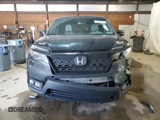 2020 Honda Passport EX-L with VIN 5FNYF8H57LB011549, listed as a Copart auction lot 59123735 with 127,797 mi miles and Salvage title. Bid and sale history available at DreamBid. Image 5.