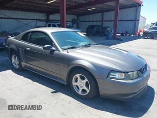 2004 Ford Mustang Standard z VIN 1FAFP40614F230723, wystawiony jako IAAI lot #42854119 z przebiegiem 182 533 mil mil oraz . Historia ofert i sprzedaży dostępna na DreamBid. Obrazek 1.