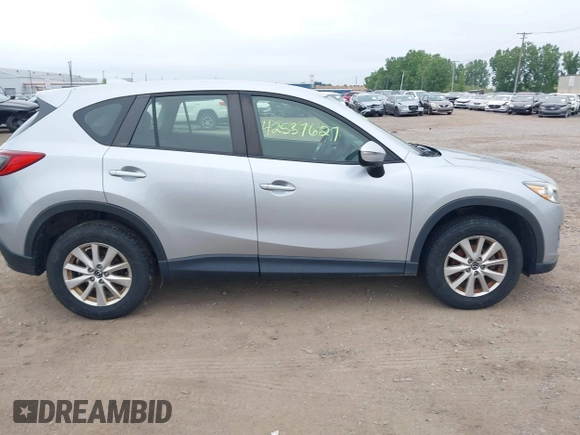 2016 Mazda CX-5 Sport z VIN JM3KE4BY1G0711602, wystawiony jako IAAI lot #42537627 z przebiegiem Nie podano mil oraz . Historia ofert i sprzedaży dostępna na DreamBid. Obrazek 13.