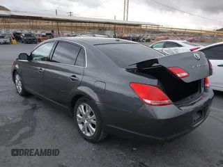 2010 Toyota Avalon XL with VIN 4T1BK3DB2AU368105, listed as a IAAI auction lot 40966346 with 147,122 mi miles and . Bid and sale history available at DreamBid. Image 3.