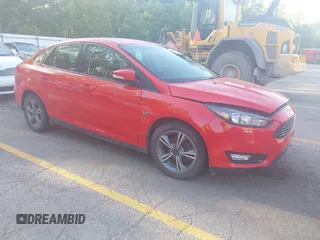 2016 Ford Focus SE z VIN 1FADP3FE1GL378019, wystawiony jako IAAI lot #42249892 z przebiegiem 55 589 mil mil oraz . Historia ofert i sprzedaży dostępna na DreamBid. Obrazek 1.