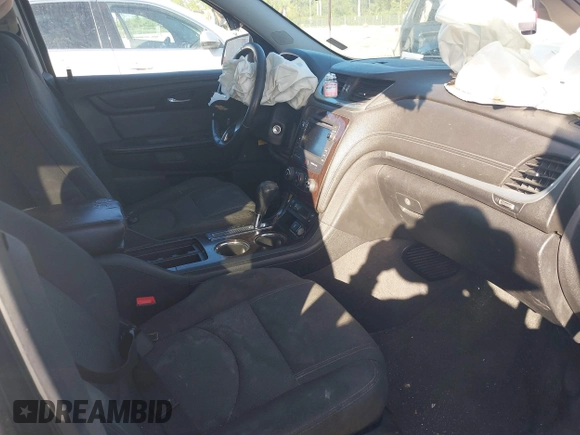 2016 Chevrolet Traverse LT with VIN 1GNKRGKD4GJ307061, listed as a IAAI auction lot 40880472 with 200,802 mi miles. Bid and sale history available at carsss.com. Image 5.