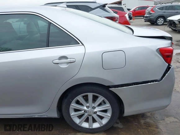 2014 Toyota Camry SE with VIN 4T1BK1FK7EU540975, listed as a IAAI auction lot 41673926 with 190,036 mi miles. Bid and sale history available at carsss.com. Image 17.