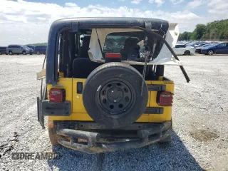 2004 Jeep Wrangler Sport with VIN 1J4FA49S84P753317, listed as a Copart auction lot 55872965 with 185,763 mi miles and Salvage title. Bid and sale history available at DreamBid. Image 6.